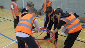 Photo of the children playing with hula hoops