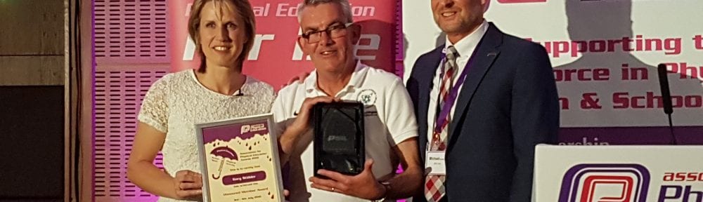 Dr Stidder with his award