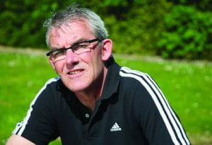 A photo of Gary Stidder who is wearing a black Adidas top